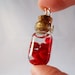 Red blood cells bottle necklace. Awesome science jewelry. Polymer clay. Free US shipping.