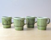 moss green mugs, ribbed, four stackable coffee cups