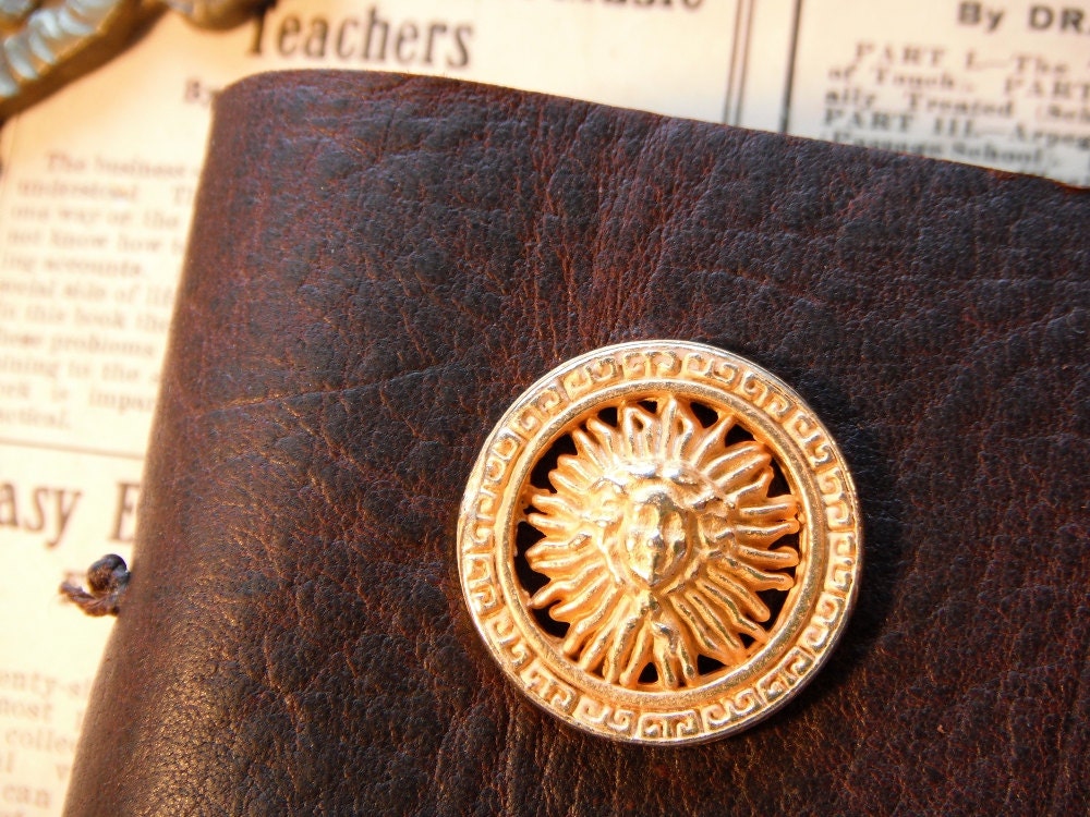Helios - leather journal with radiating golden sun