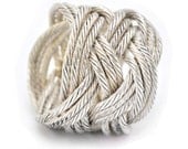 A knot ring, woven with fine silver