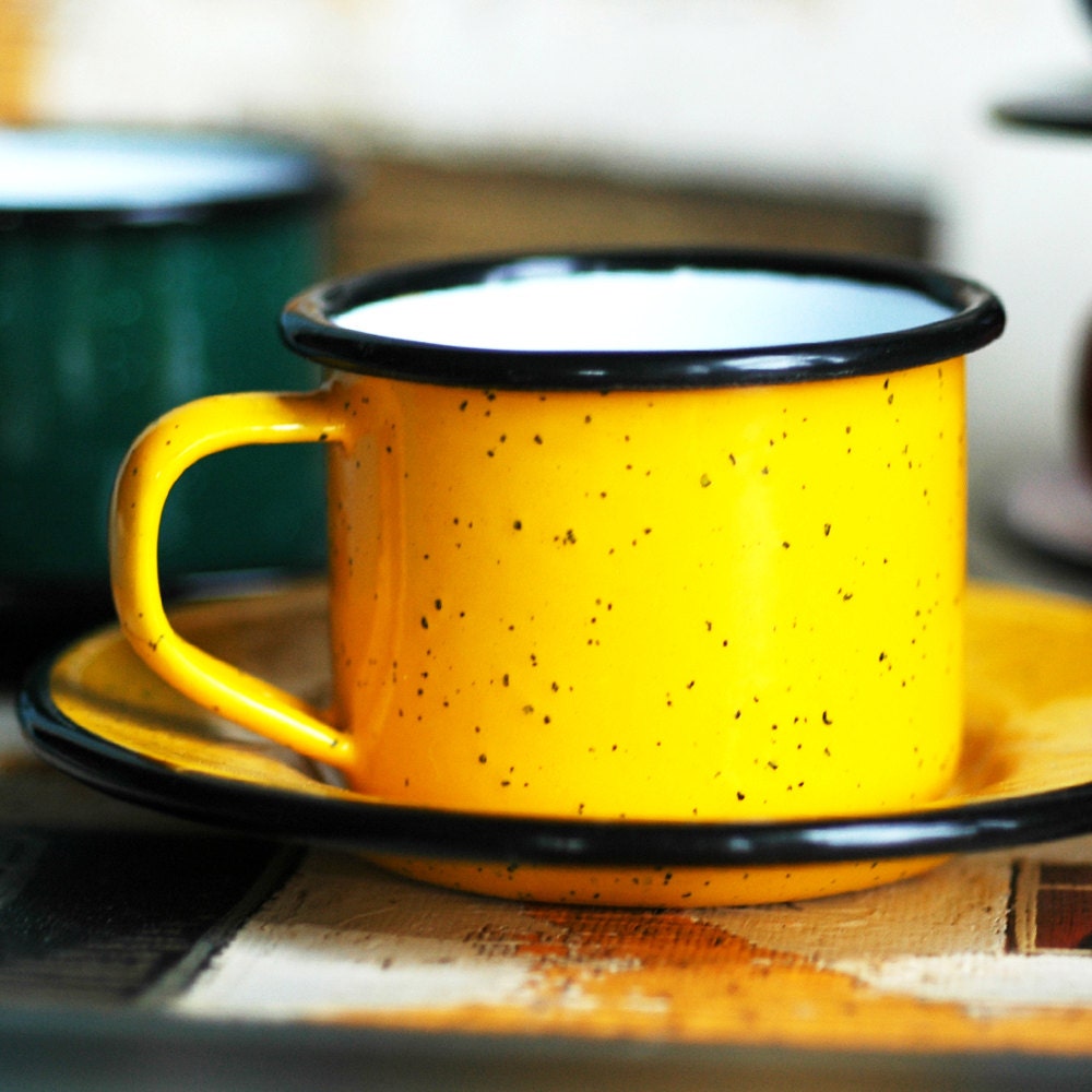 this one is YELLOW...  enamel metal cup with a saucer...  L