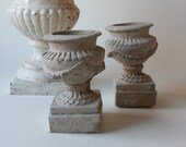 two cement urns