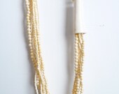 Long Multi strand Asymmetrical Bone and Antler Bead Necklace