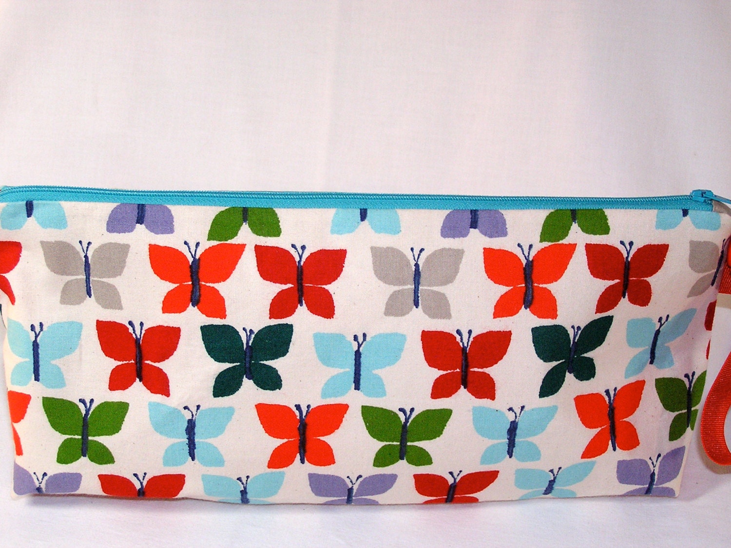 Canyon Flutter  Anna Clutch in Multi