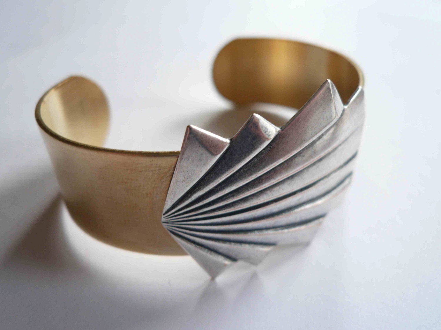 Mixed metal art deco cuff. Bracelet with brass cuff and brushed silver geometric fan.