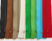 Eight 12 inch Handbag YKK zippers with long pull - dark and medium brown, tan, off white, red, 2 shades of green, bright aqua, and red