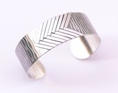 Geometric silver cuff, playful design of light and dark lines with an overall multidimensional contrast rich look - "Allegro Cuff"