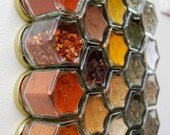 Magnetic Spice Jars Reserved for the Wedding Registry of Giselle & Thomas.