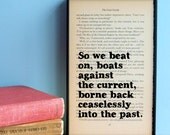 The Great Gatsby quote 'So we beat on' vintage book page framed print