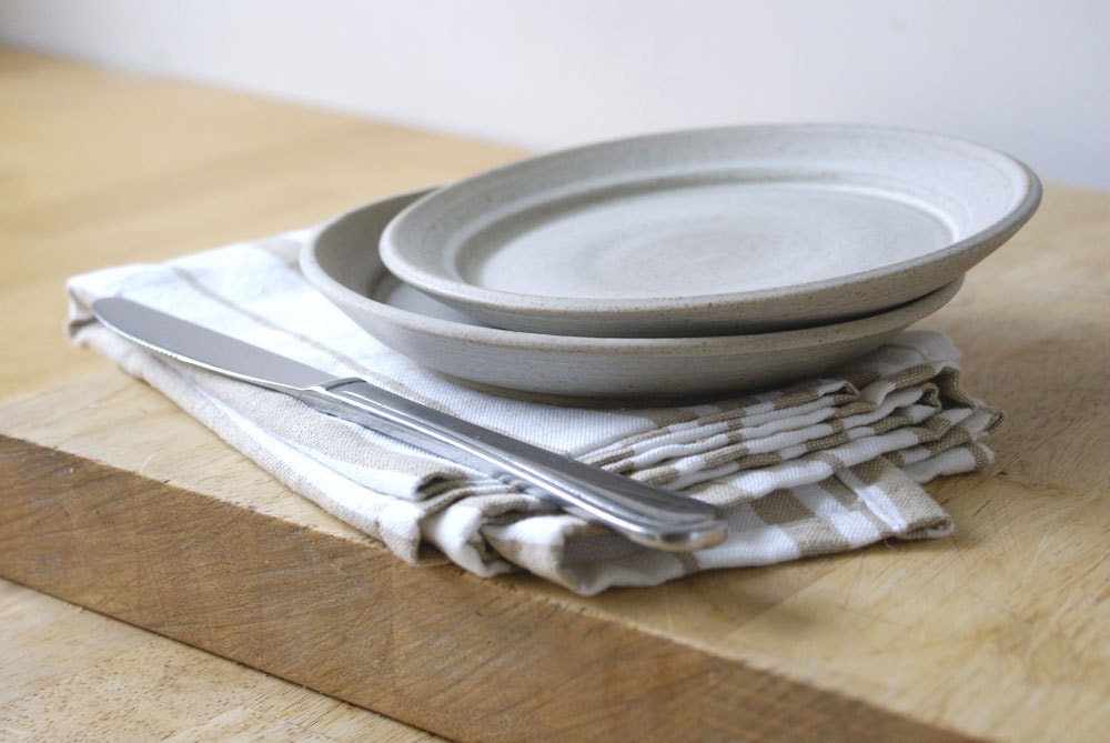 A set of six stoneware side plates for your home - glazed in vanilla cream