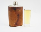 leather and glass tequila flask