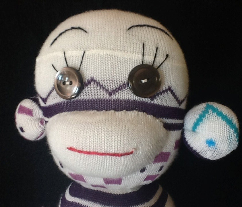 White geometric patterned Unique Sock Monkey with extra long arms & tail