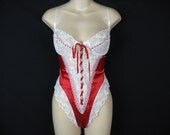 burlesque. frederick's red and white teddy. ribbons and lace. medium.