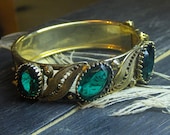 Vintage Golden Brass with filigree and Emerald Glass Rhinestones Cuff Bracelet