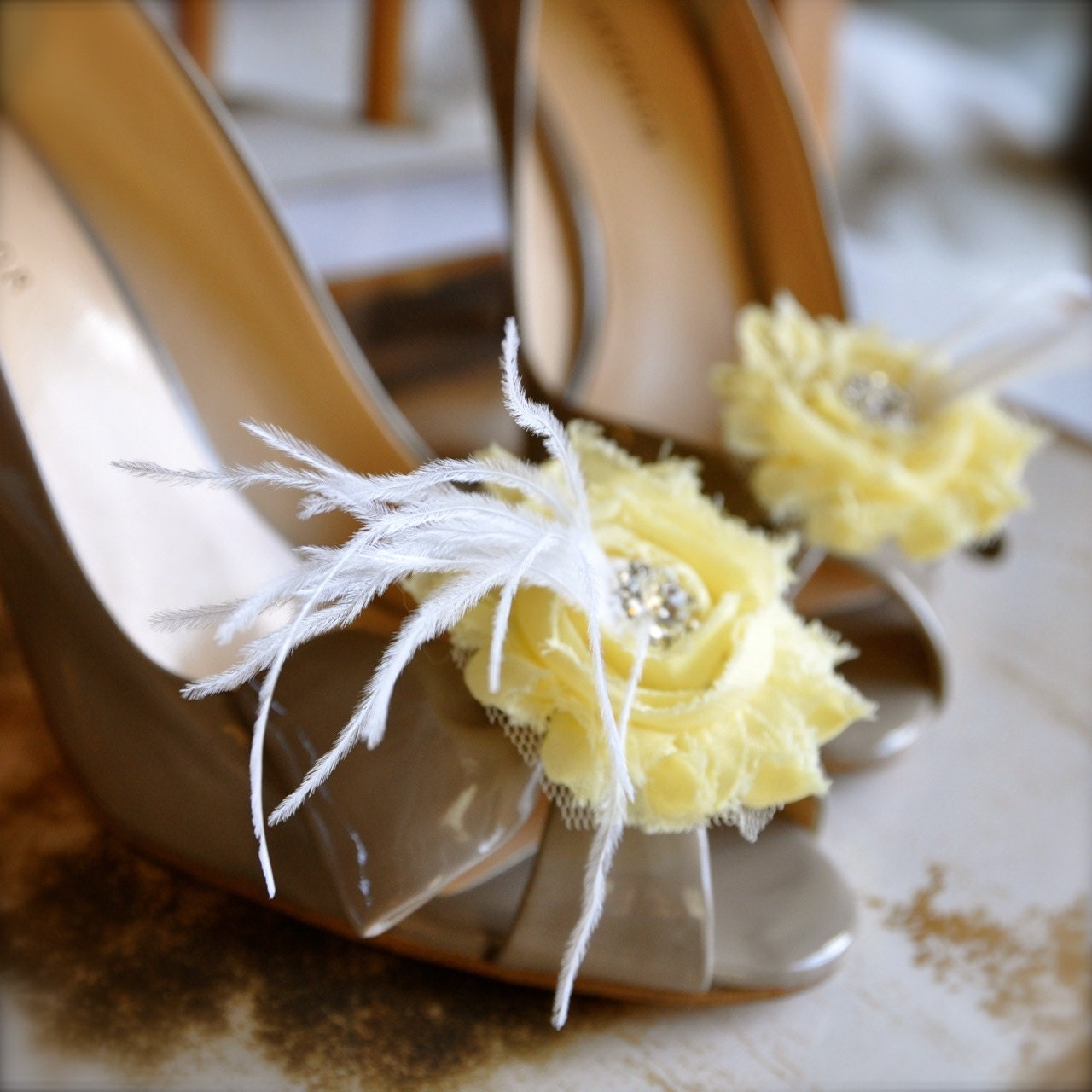 Chic feather blossom shoe clips with rhinestone centers. Spring pastels, brights or classic neutrals.