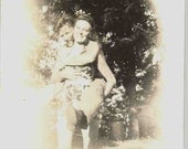 Vintage Photo of a Woman Riding a Man on Her Back M023