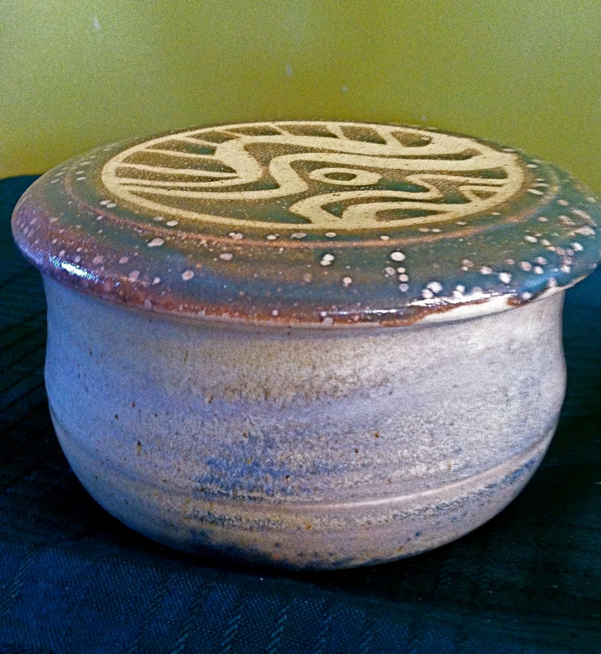 Butter dish with gold and dark green wax-resist glazed