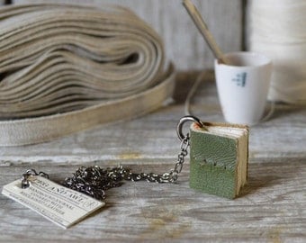 Book Necklace: Medium, green bit of sofa, reclaimed leather.