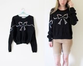vintage 1980s sweater // black // folk print bow // boxy and cropped // size medium m // large l