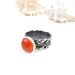 Sterling silver metalwork ring with carnelian, ornament band