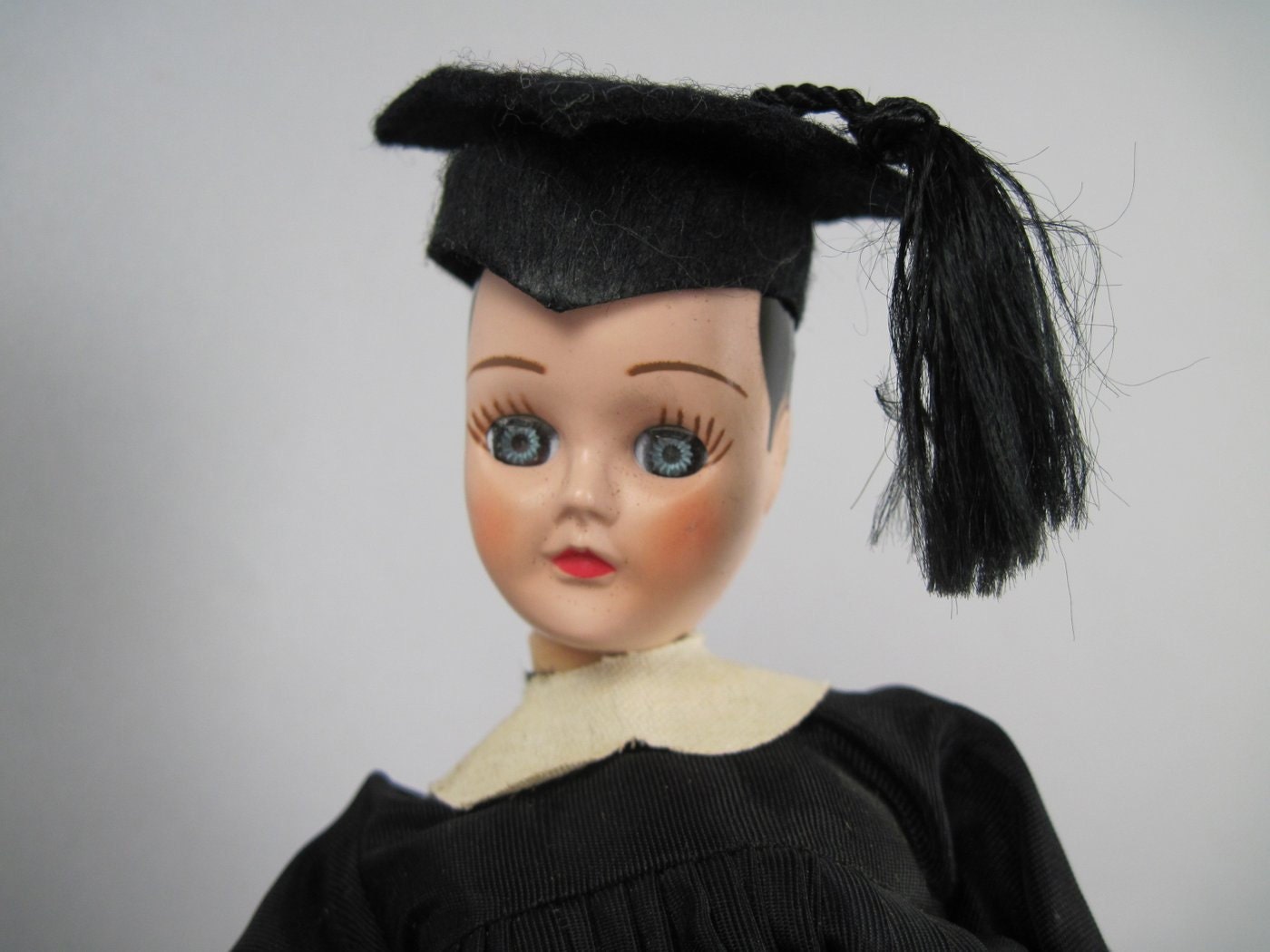 Graduation Girl - 1950s Plastic Doll in Black Cap and Gown