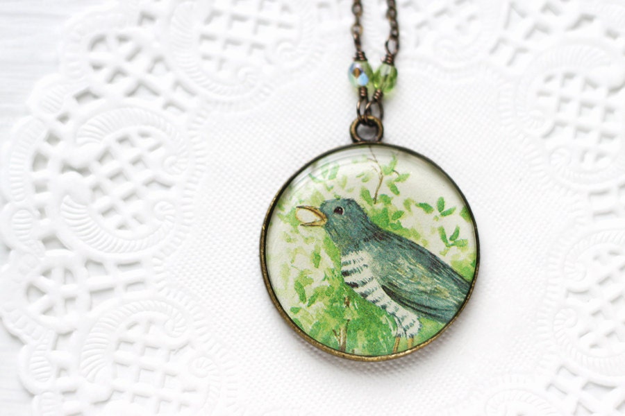 Mockingbird Art Pendant Necklace - Grey Mockingbird with an Egg in it's Beak in Green Bushes from Vintage Children's Storybook