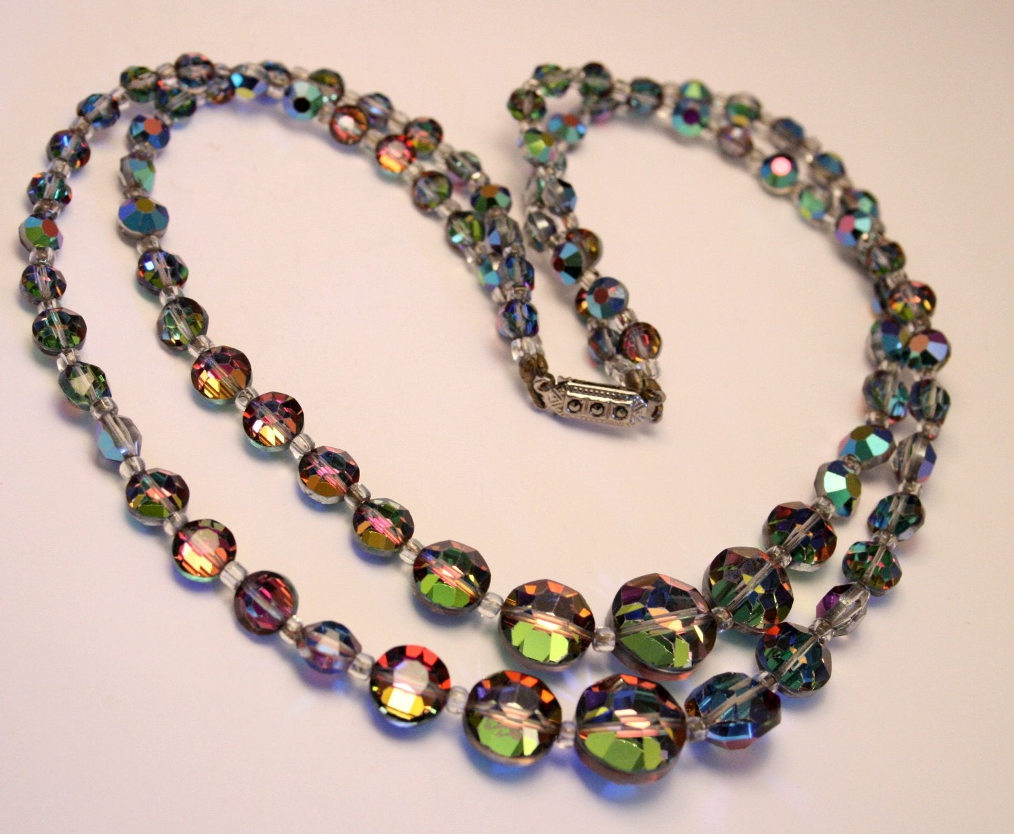 Vintage carnival glass bead necklace. 2 rows. Aspirin shape