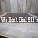 We Don't Dial 911 Hand Painted Wood Sign-Distressed-Guns