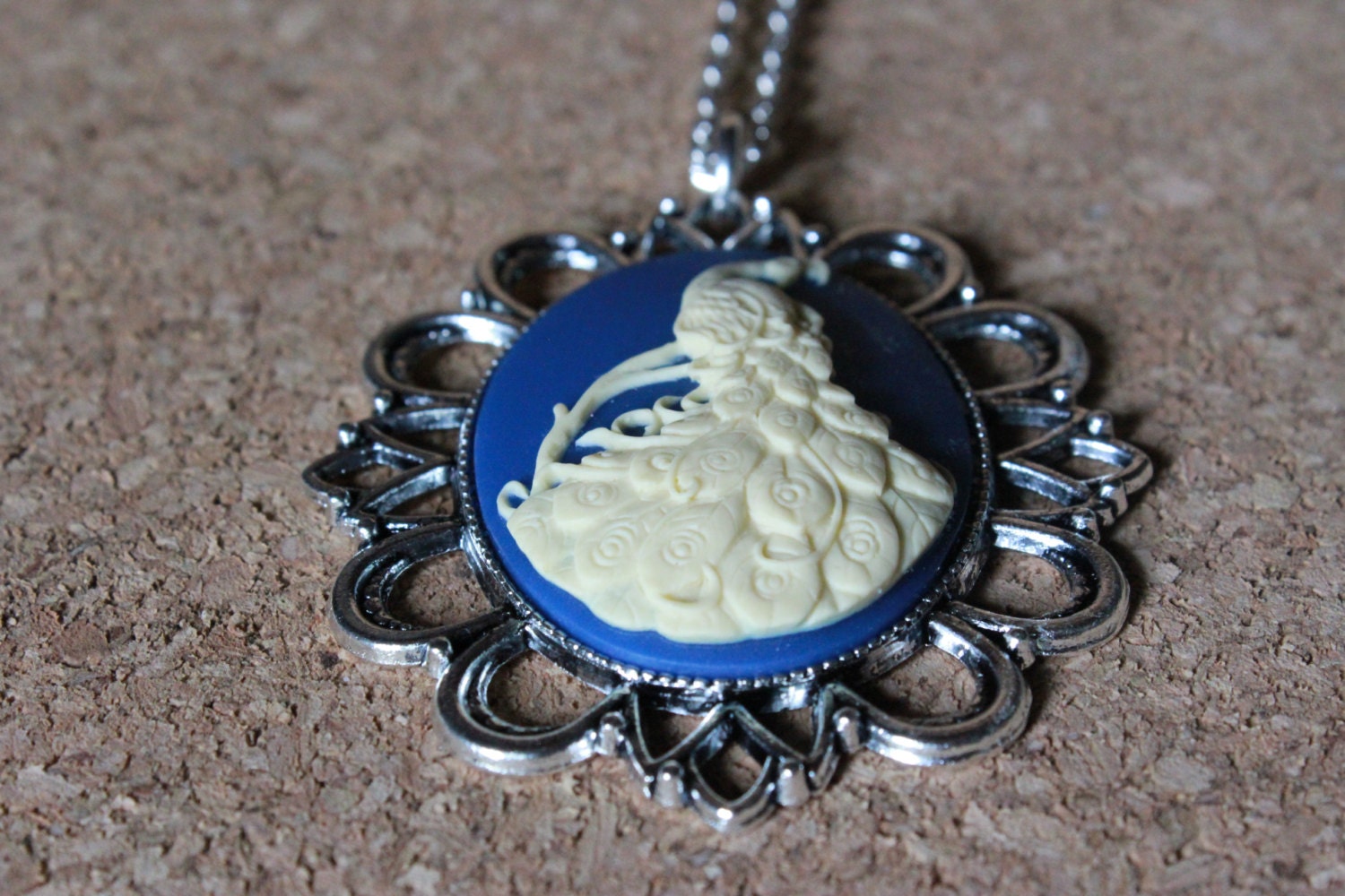 Matte Blue Resin Pendant Necklace with Cream Peacock Cameo on Silver Chain