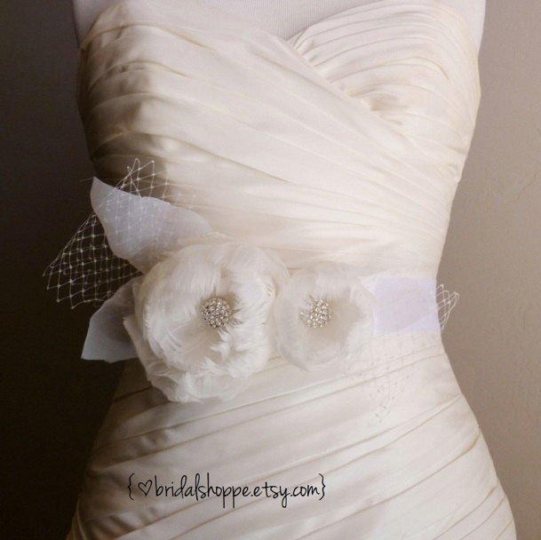 Wedding Sash Breelynn - White Goose Feather Flowers and Organza Leaves on White Bridal Sash with Rhinestones