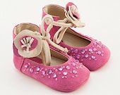 Pink baby shoes from crystal-embellished leather
