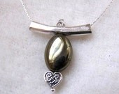 Hematite and celtic knot heart necklace