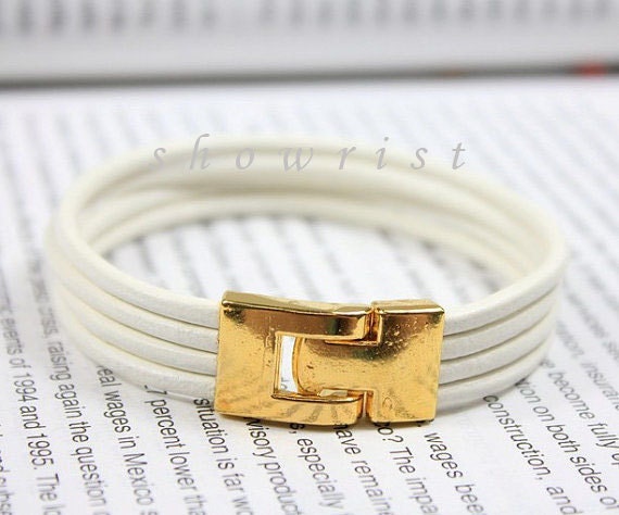 White leather bracelet with gold plated cuff closure TS135
