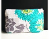 cosmetic bag made of grey flower fabric with waxed cotton lining - polka dot