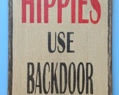 Hippies use back door sign made from reclaimed plywood