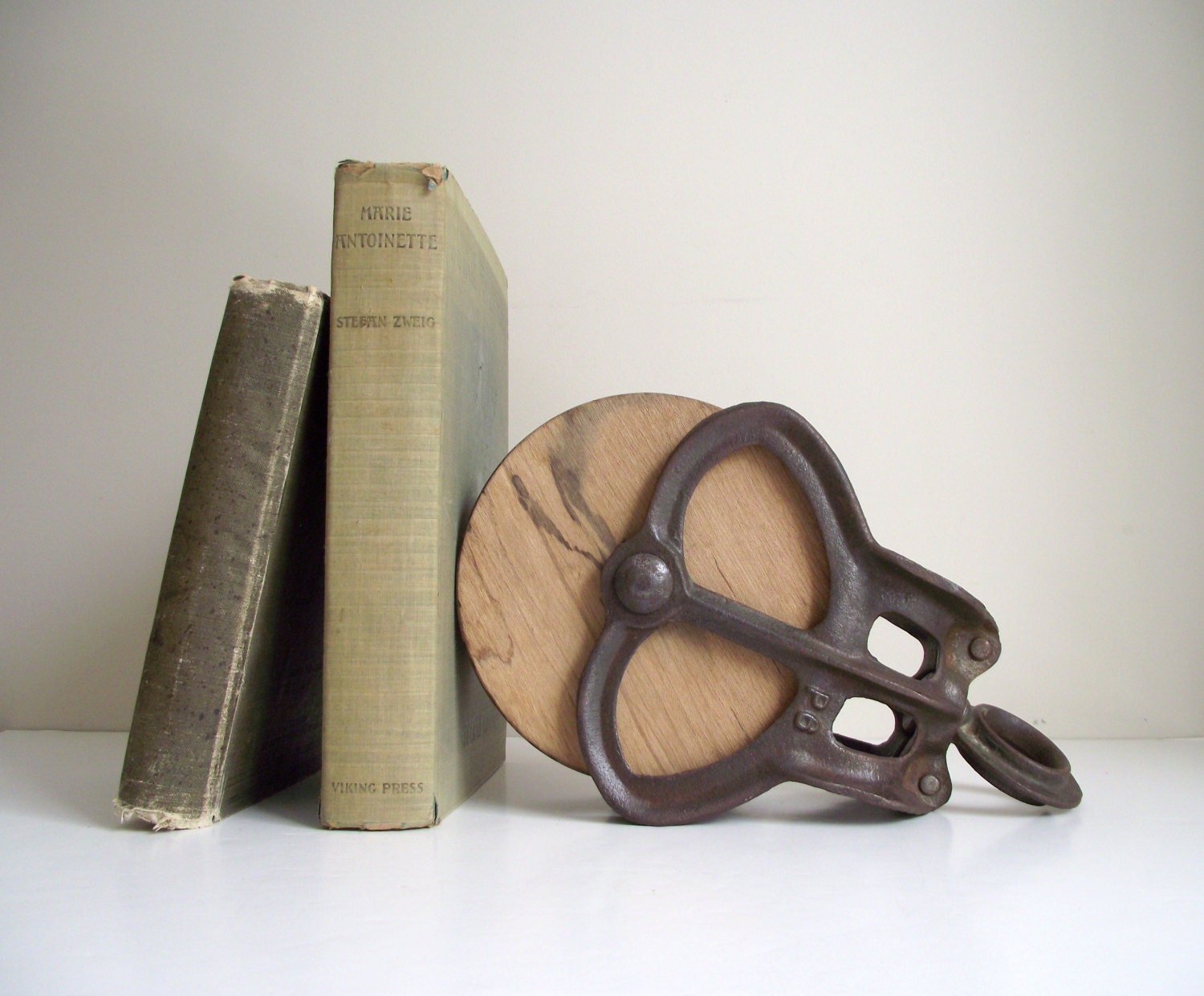 Antique Barn Pulley Industrial Cast Iron and Wood Repurposed Bookend