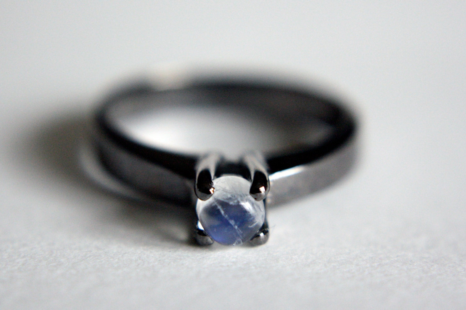 Moonstone Solitaire in Black Rhodium