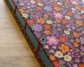 Small Coptic Stitch journal in Funky Colorful Flowers. Purple, orange, olive green with teal pages (Retro 1970s/ 70s inspired)