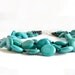 ELEGANCE. turquoise multistrand necklace with smooth coin stones and matte black agate. sterling silver. fe