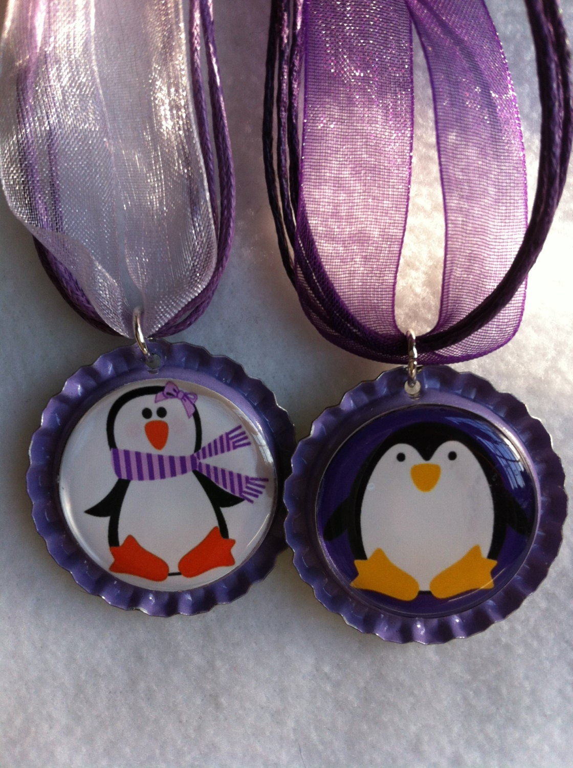 Whimsical Penguin bottle cap with  ribbon strand necklace