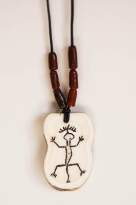 Necklace with wild boar ivory pendant
