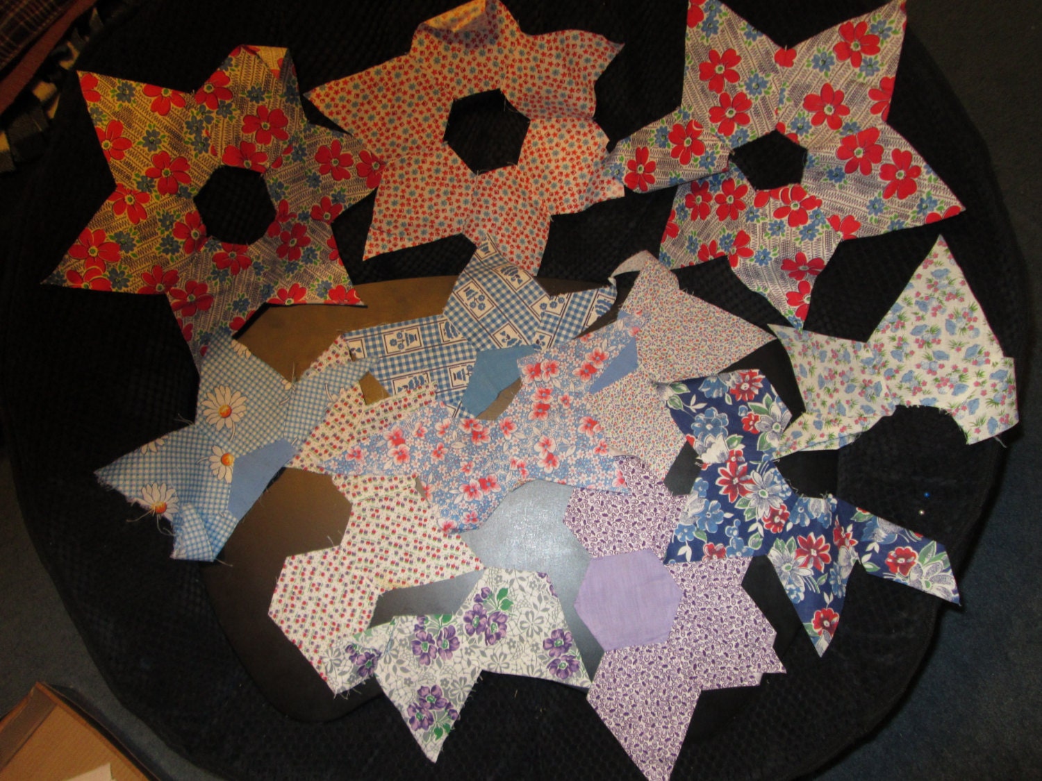 Quilt starts, hand and machine pieced