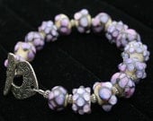 Beautiful Handcrafted Ivory with Purple Accents Lampworking Beaded Bracelet