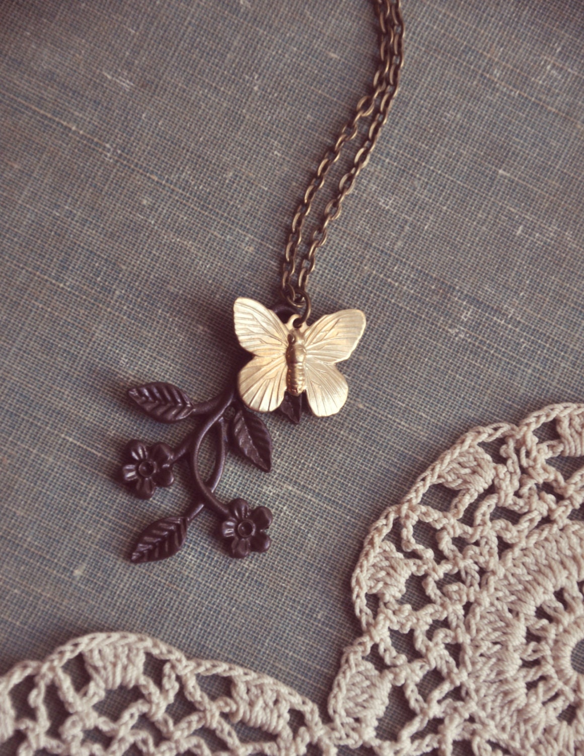 butterfly and vine necklace.