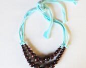 Color Pop Necklace in Dark Chocolate & Cotton Candy . Non-toxic Beads with a Jersey Tie . Fashionable and baby-friendly
