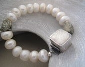 Pearl and pyrite bracelet with silver clasp