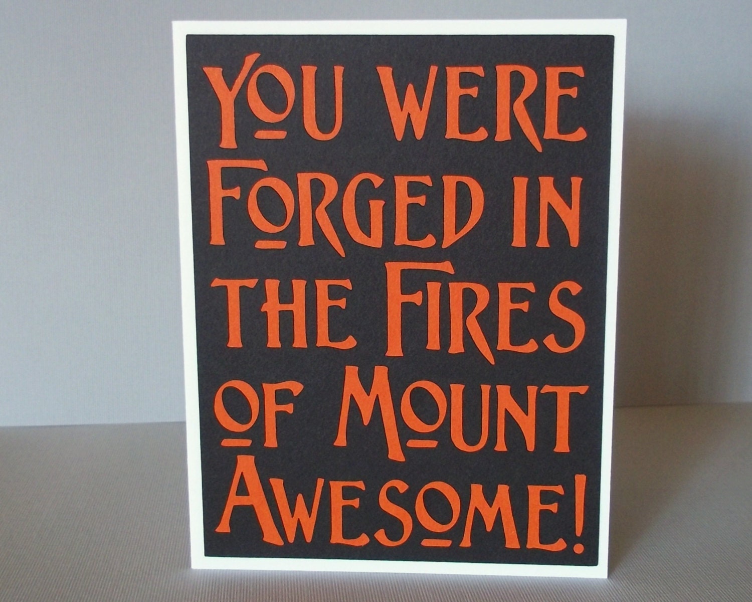 You were forged in the fires of mount Awesome- Black Card with Orange lettering- Lord of the Rings / Hobbit Inspired- Blank inside
