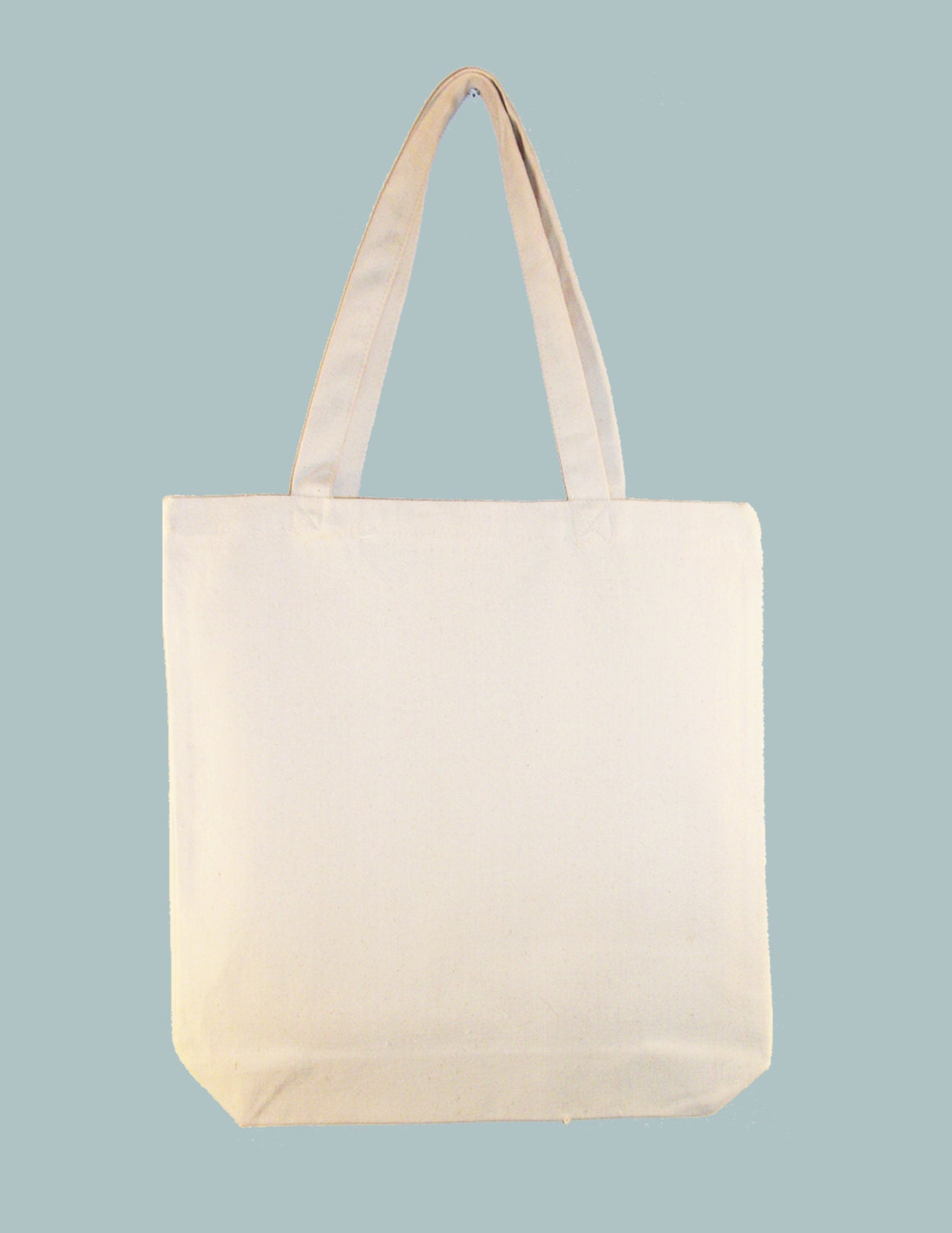 YOUR DESIGN (or ours) heat transferred onto 15x15x3 Canvas tote with Shoulder Strap