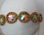 golden headband with iridescent jewels