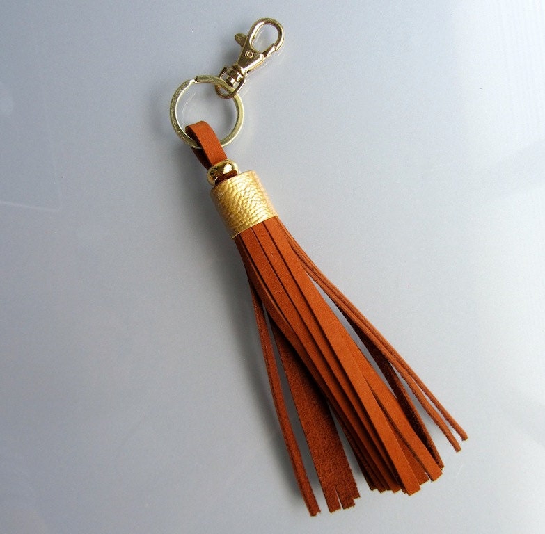 Luxury leather tassel / keyfob / keychain in rust orange nubuck suede and gold ostrich leg skin.